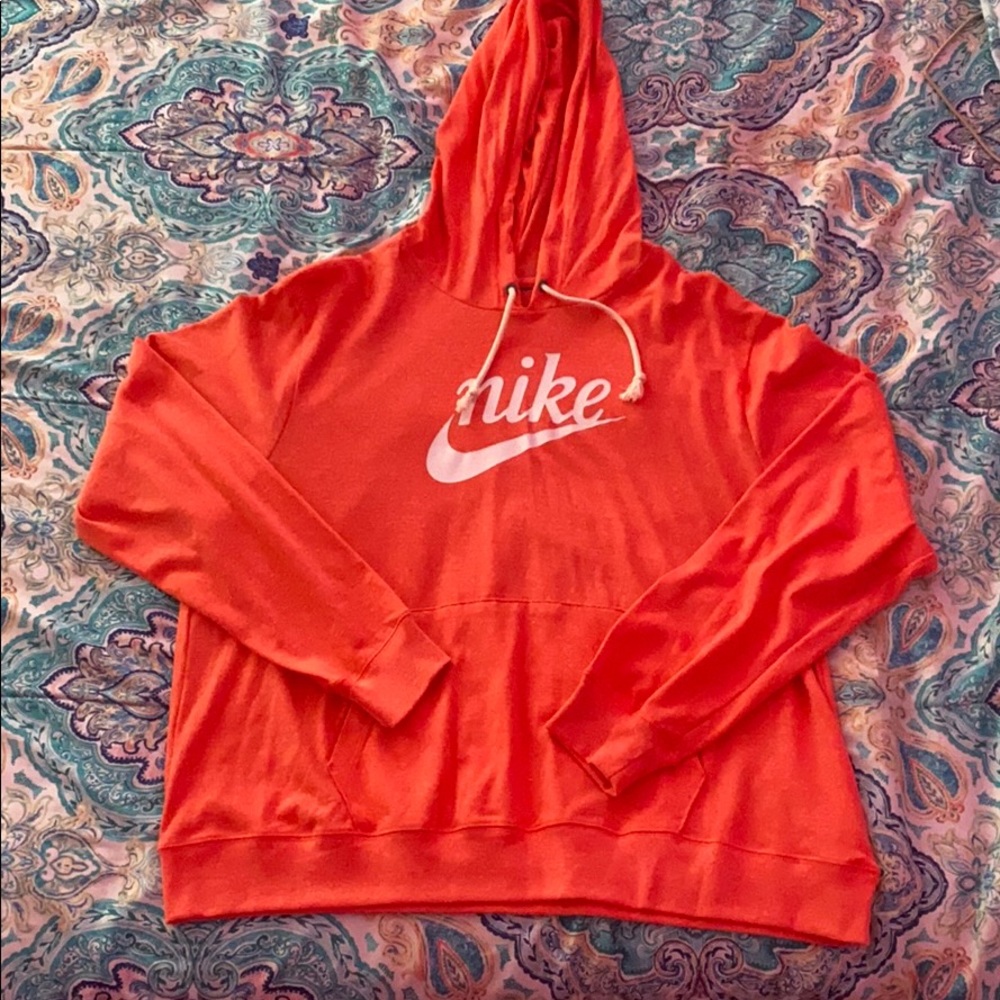 Coral colored Nike hoodie